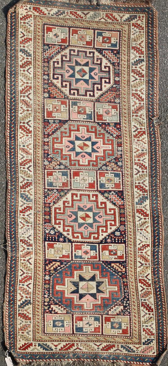 A Shirvan multi coloured runner, c.1900, 8ft 9in by 3ft 1in.